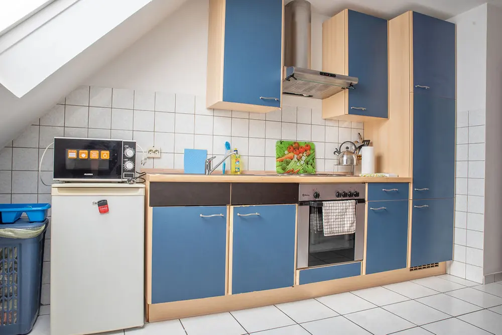 Kitchen with blue cabinets